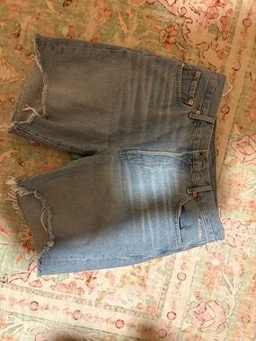 Levi’s 501 90’s Low Waisted Distressed Light Wash Denim Shorts